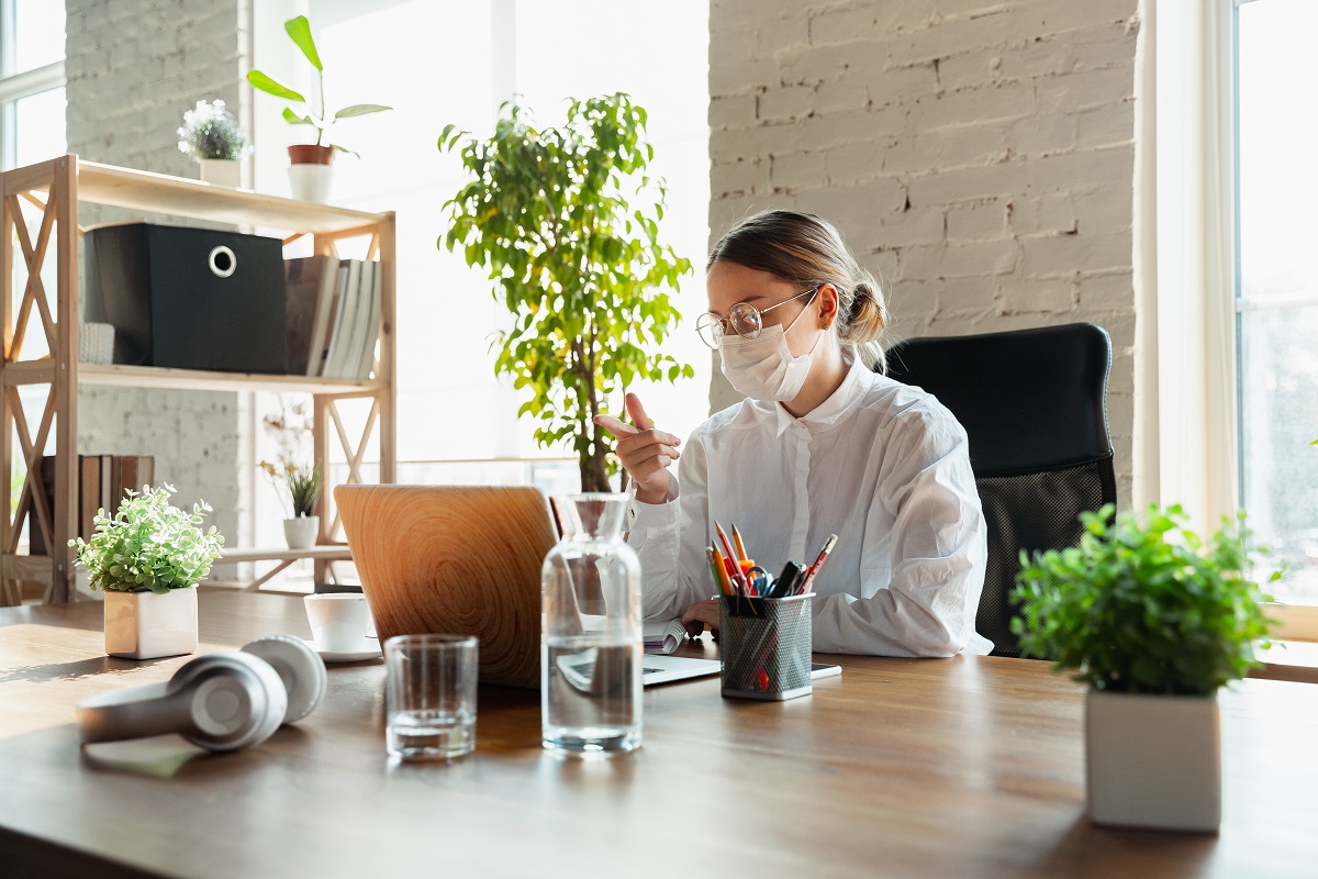 Woman working from home during coronavirus or COVID-19 quarantine, remote office concept